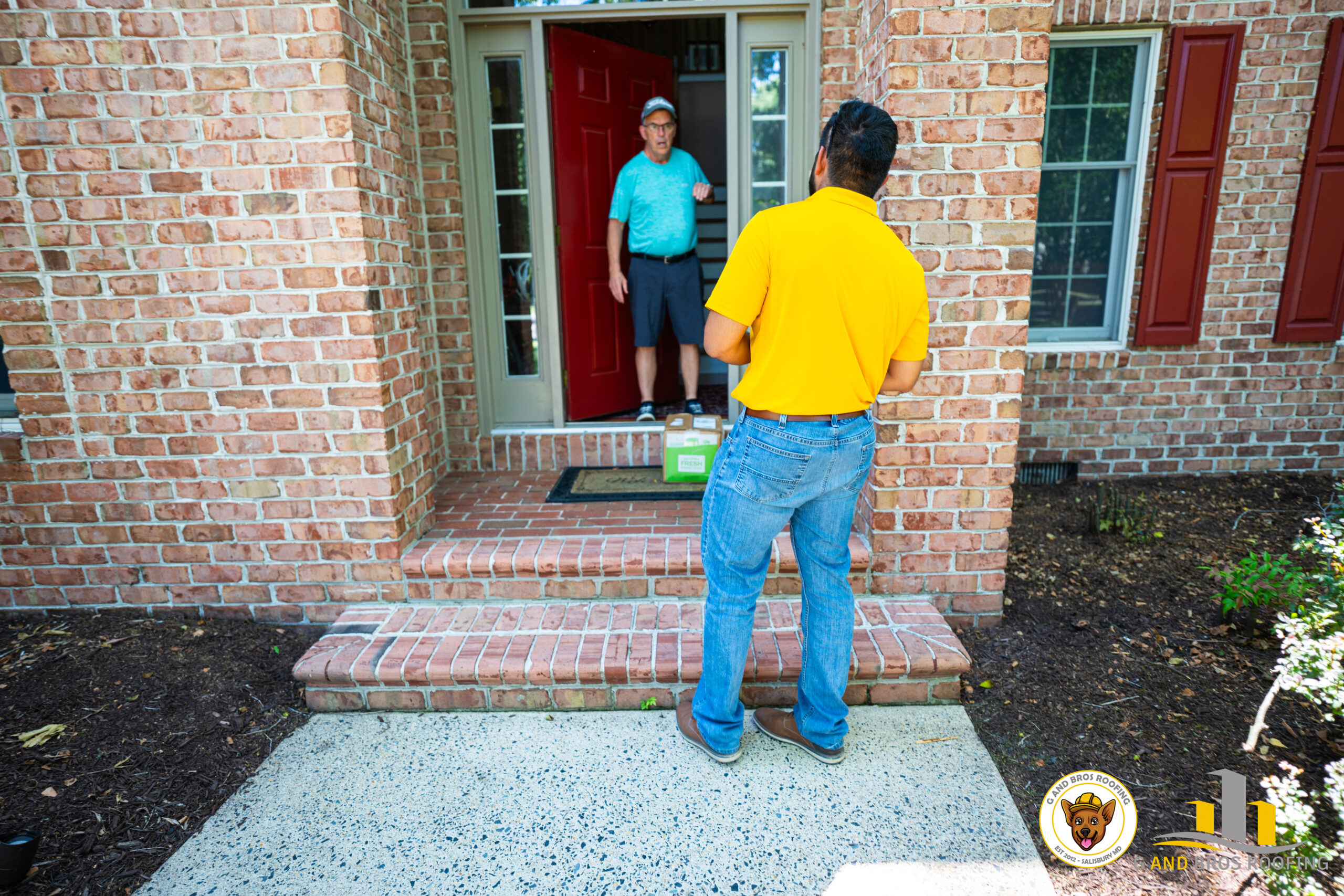 G and Bros Roofing a locally based roofing contractor in Salisbury MD Guillermo Molina Matus having his final walk through with the customer.